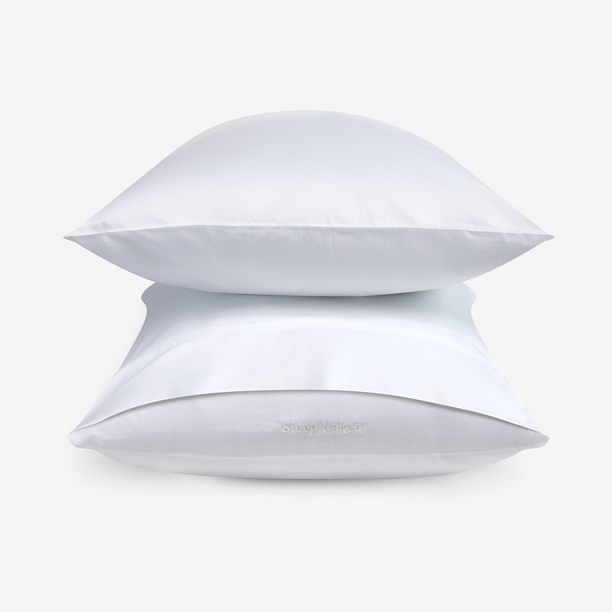 Two white pillowcases stacked on a clean white background.