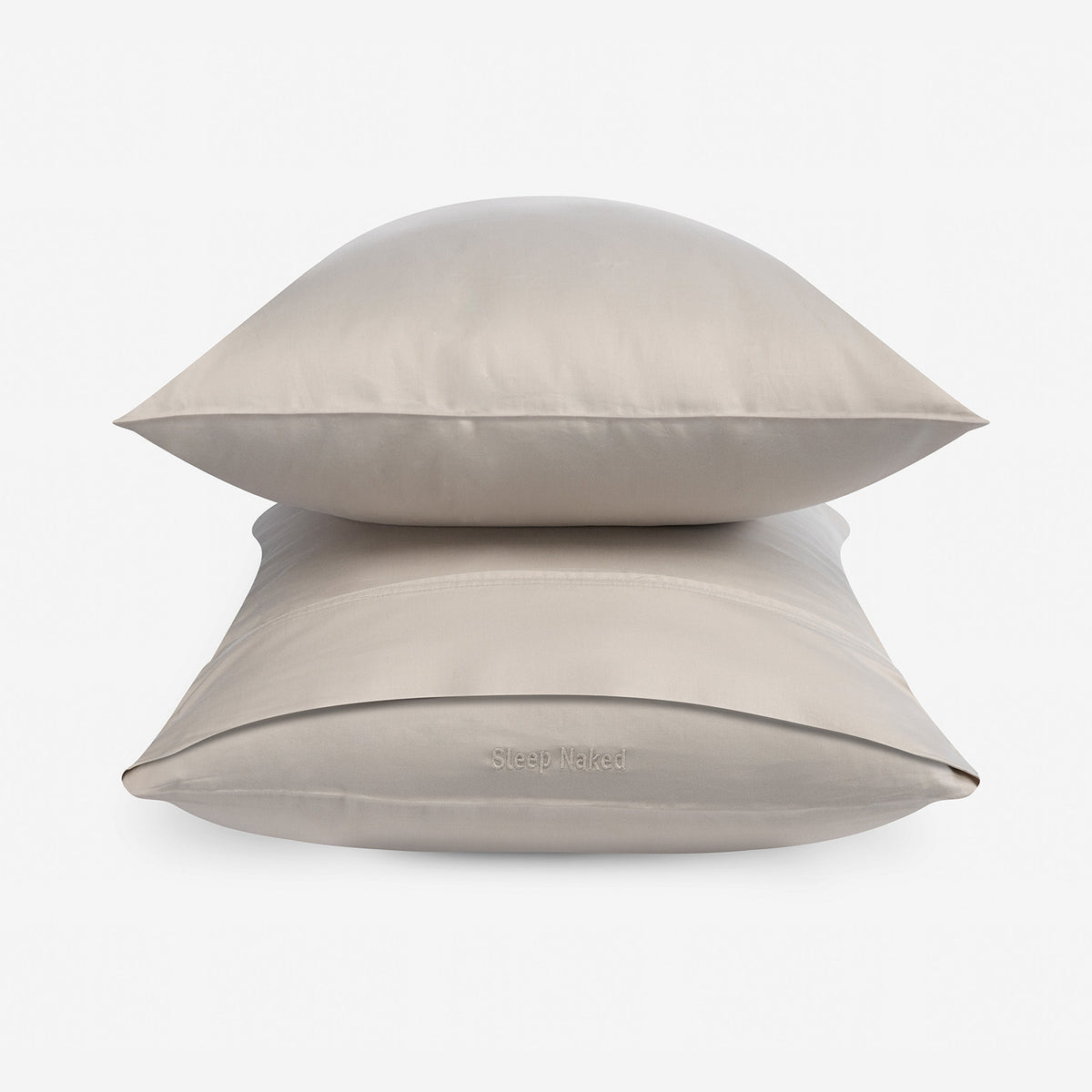 Two stacked pillowcases in a taupe color on a clean white background.