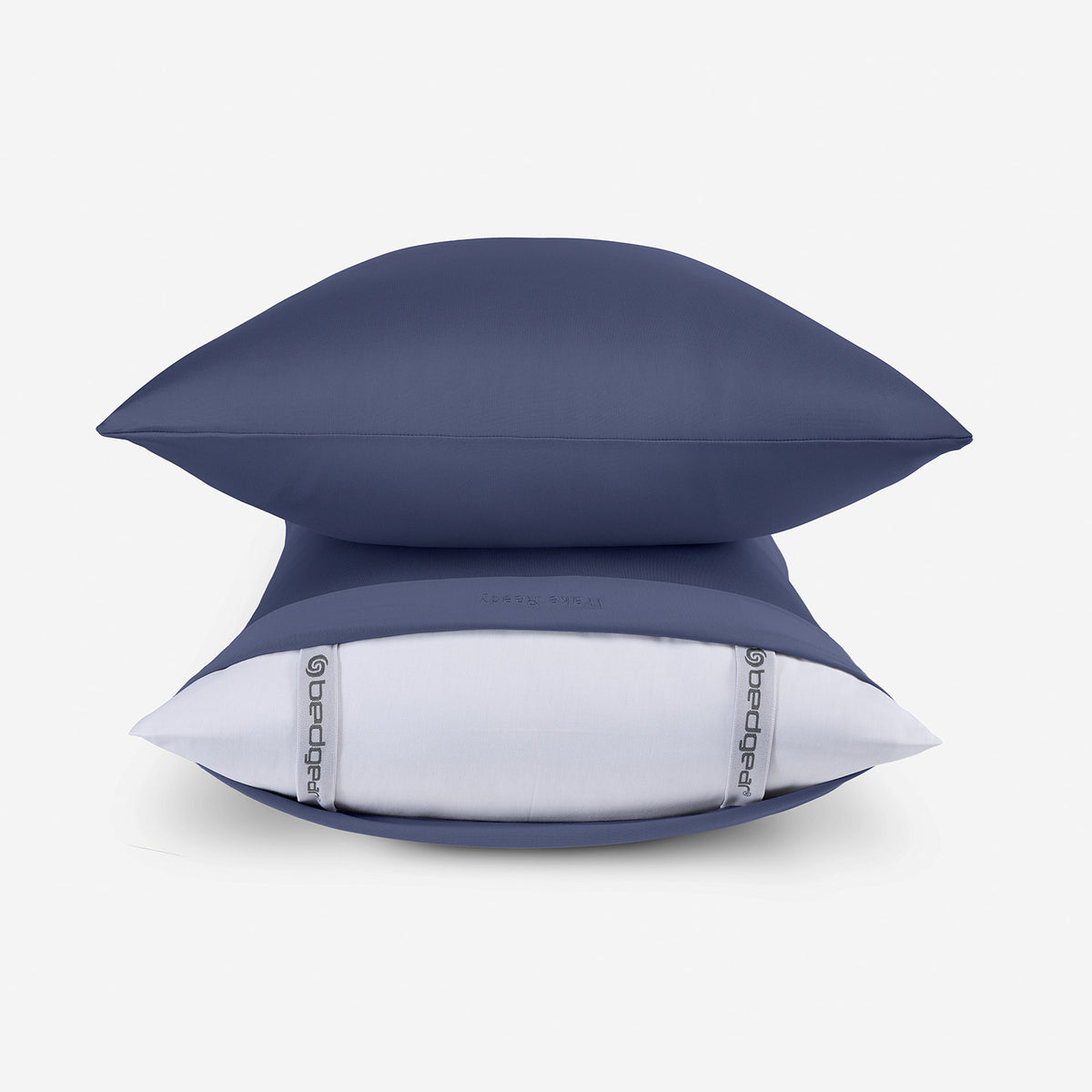 Two blue DriTec pillowcases stacked.