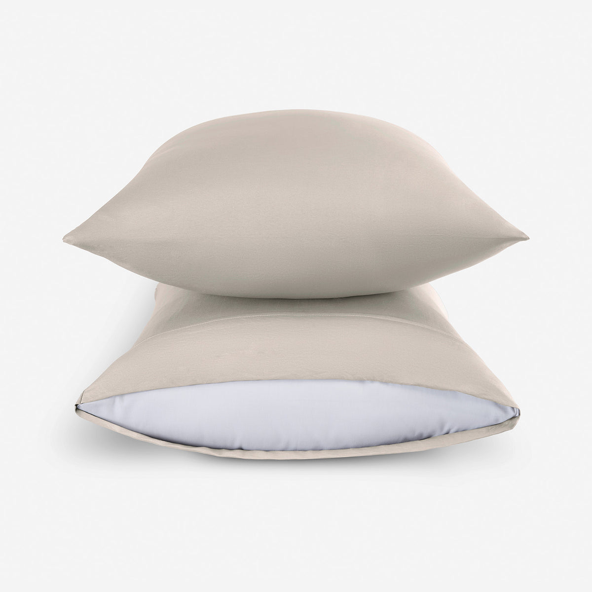 Two essential taupe pillowcases stacked.