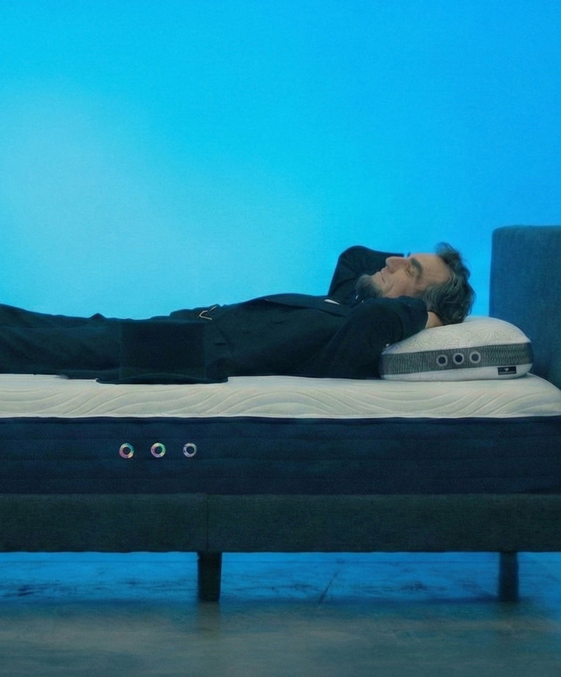 A man sleeping comfortably on the right mattress size.