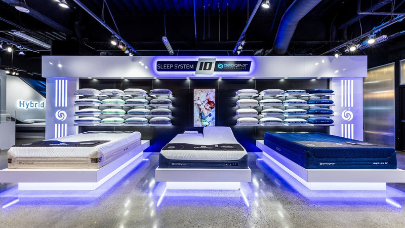 An image of BEDGEAR's mattresses in a showroom. 