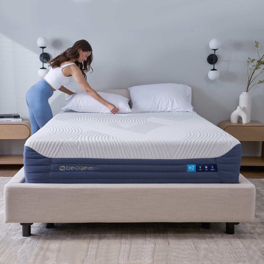 A woman making the best adjustable base for shoulder pain. 