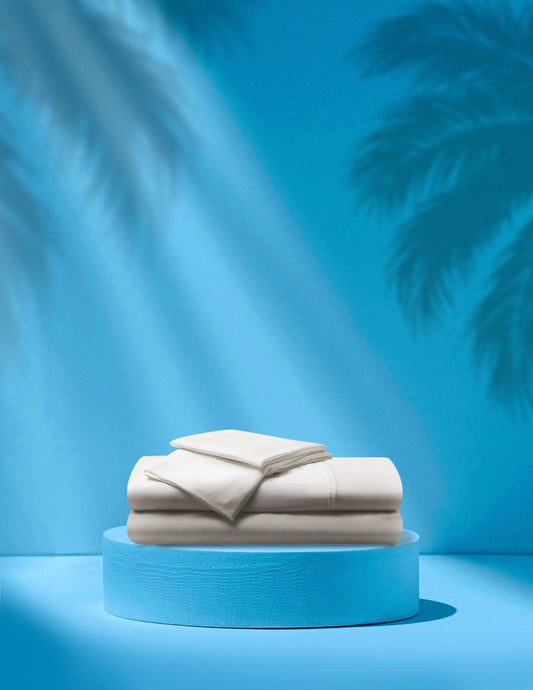 Bed sheets surrounded by a summer background. 