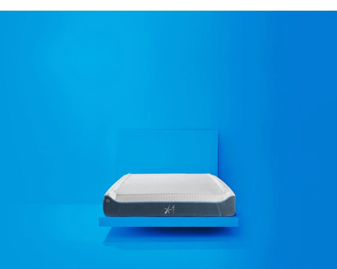 A photo of the X1 children's mattress in front of a blue background. 