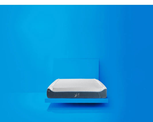 A photo of the X1 children's mattress in front of a blue background. 