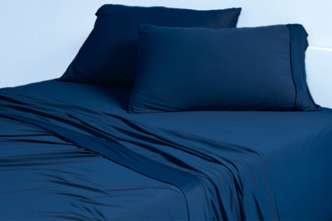 Blue Sheets on a full size mattress.