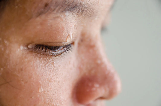 A person dealing with night sweats.