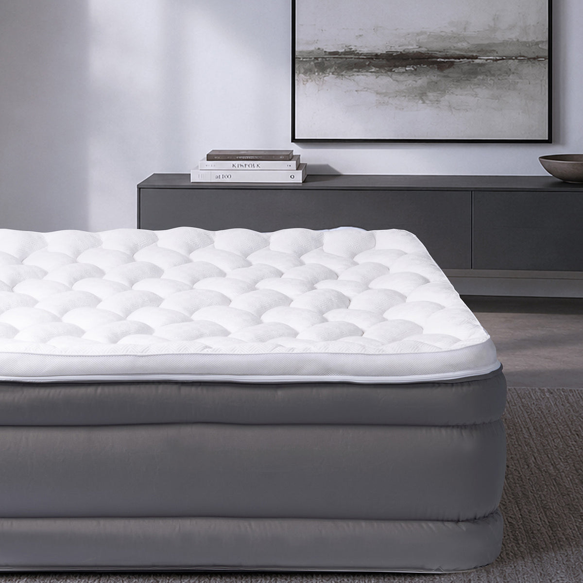 A queen size air mattress in a bedroom