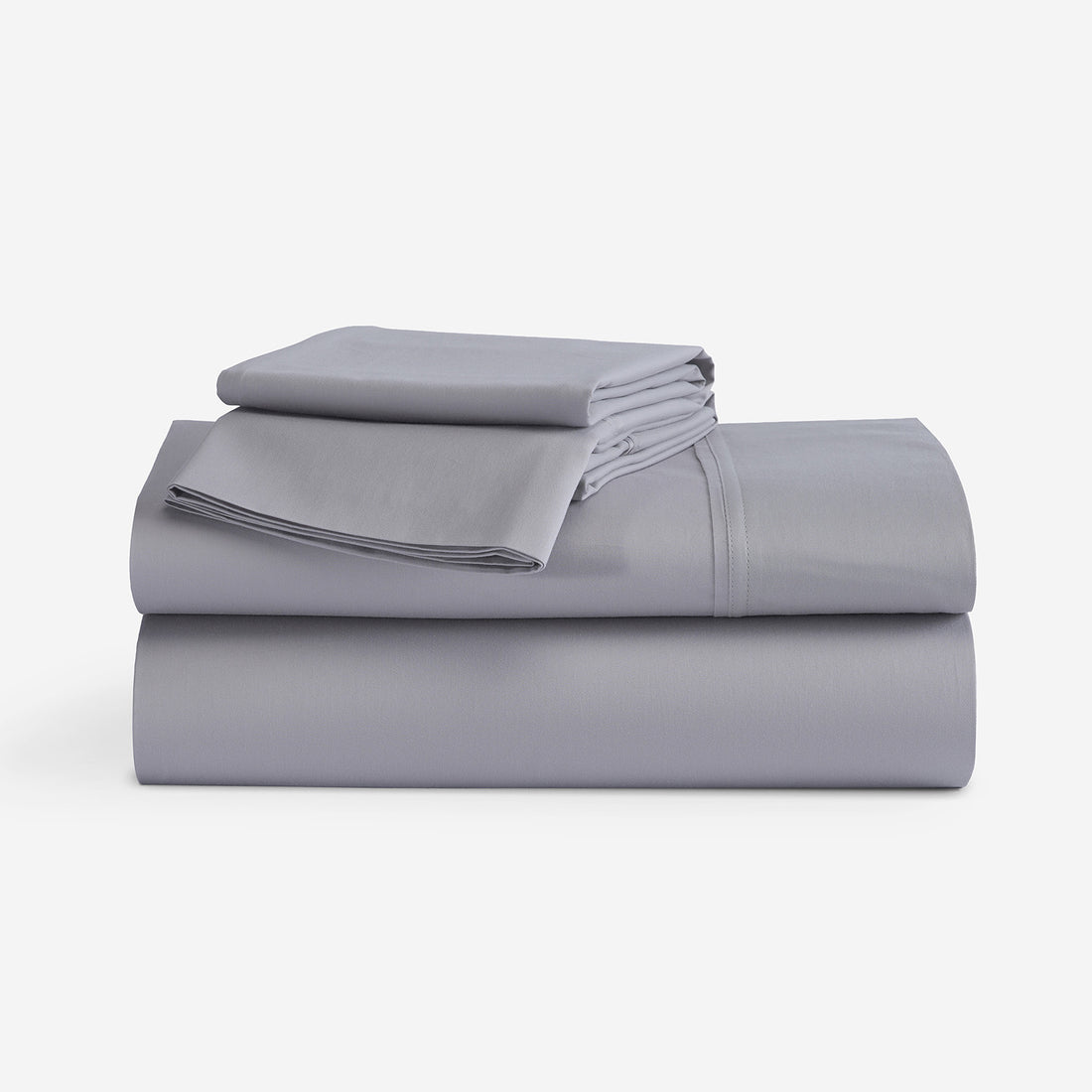 A stack of folded gray bedding, including a folded sheet and folded pillowcases, displayed on a clean white background. "Light Grey"