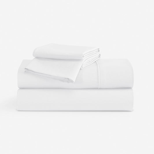 An image of white essential sheets in front of a white background. "white"