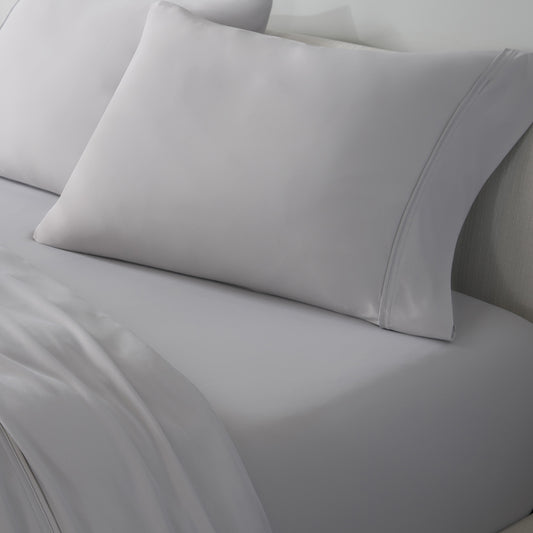 An image of light grey VerTex sheets and pillowcases. 