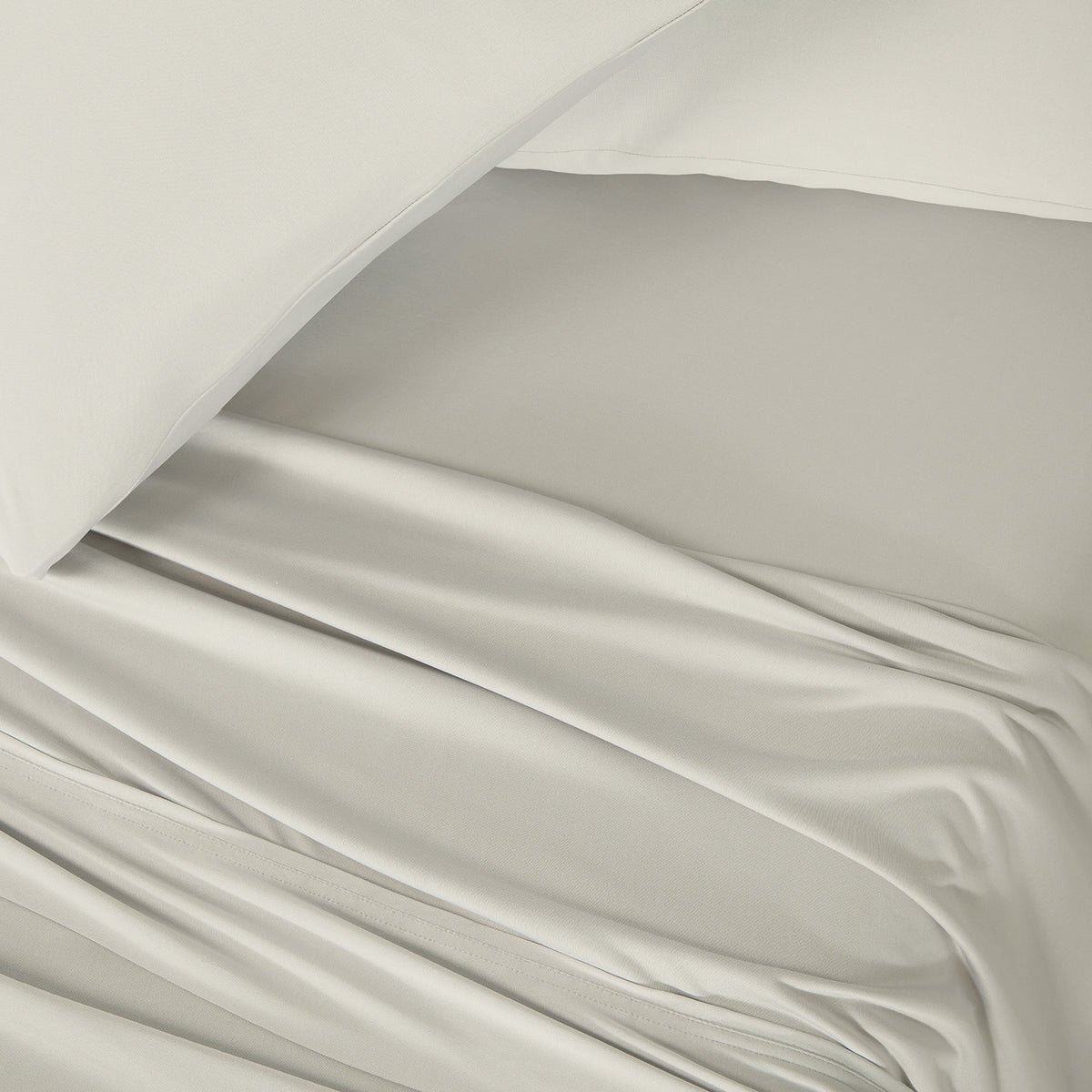 DriTec sheets flowing on a bed.