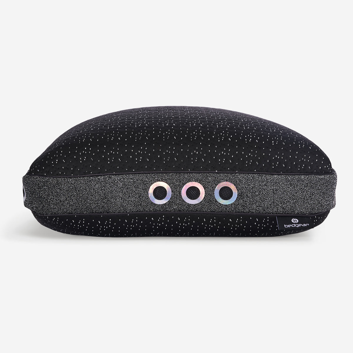A side view photo of a dark night pillow with its air vents.