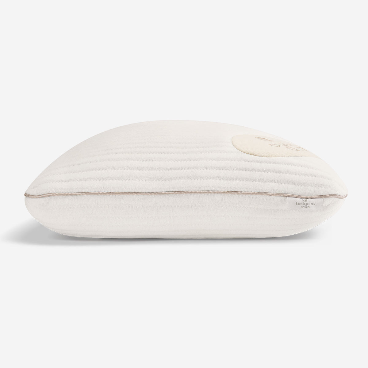A side profile view of 0.0 Calm Pillow on white background.