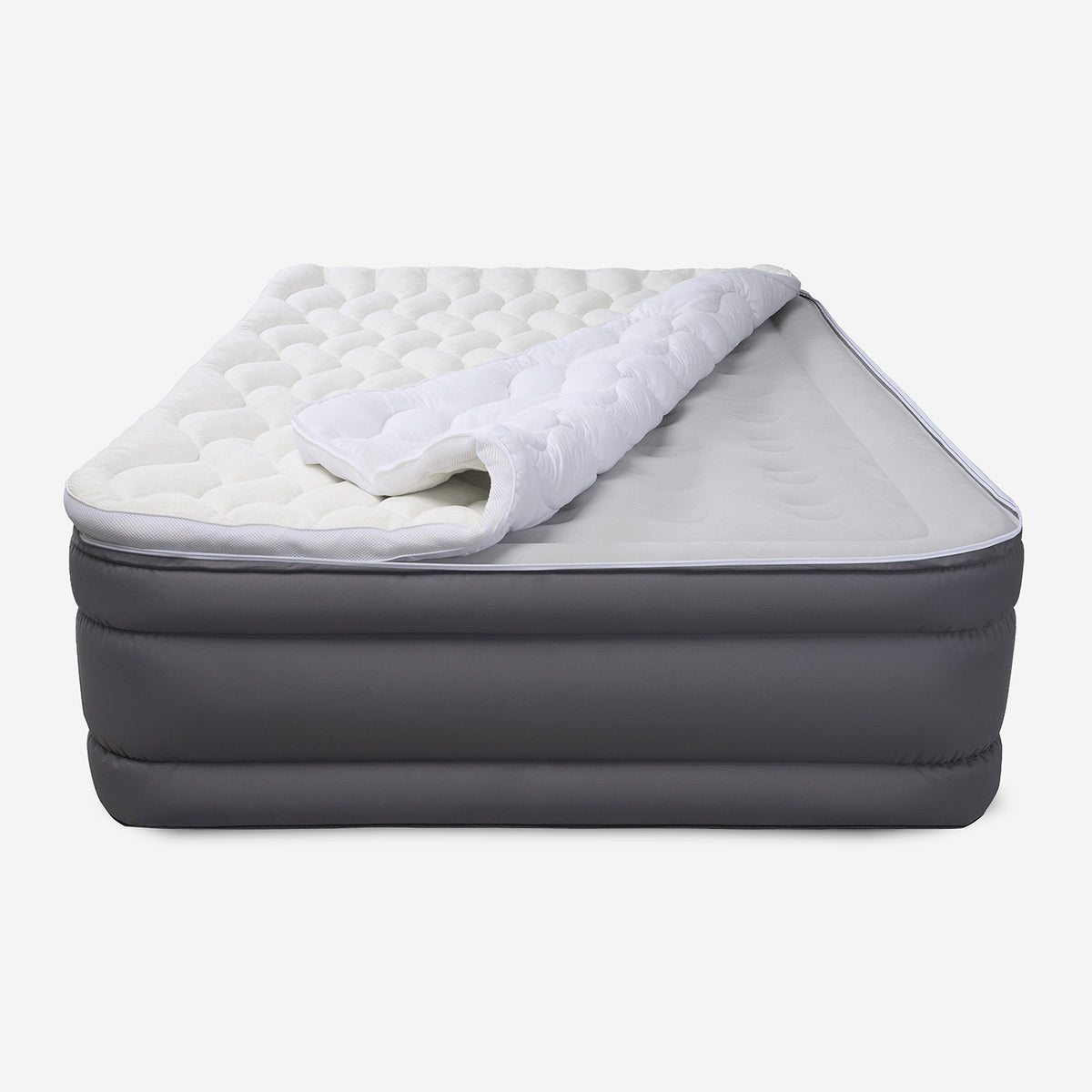 A queen air mattress with the zip off cover partially removed.