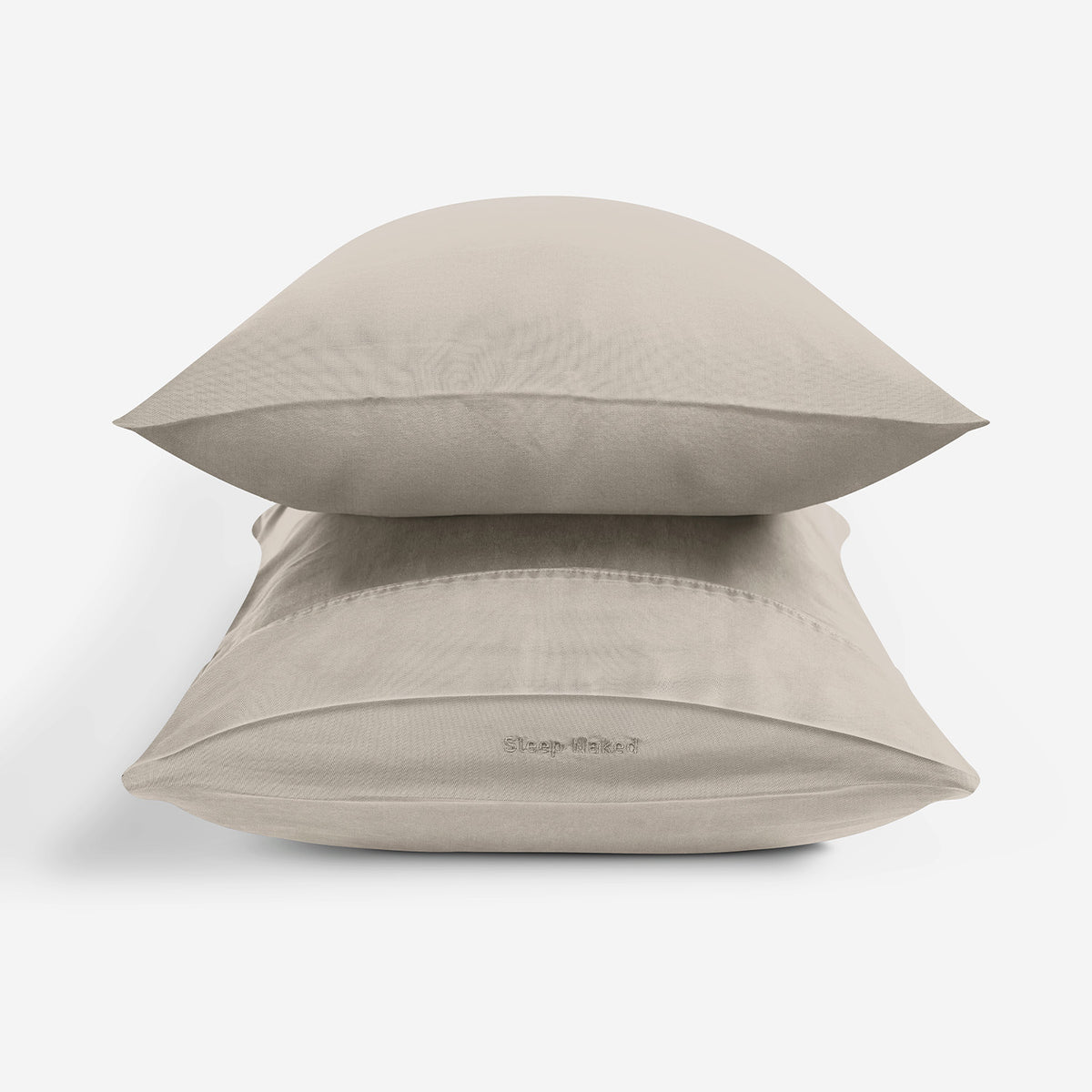 Two stacked pillowcases in a light taupe-beige color, shown on a clean white background.