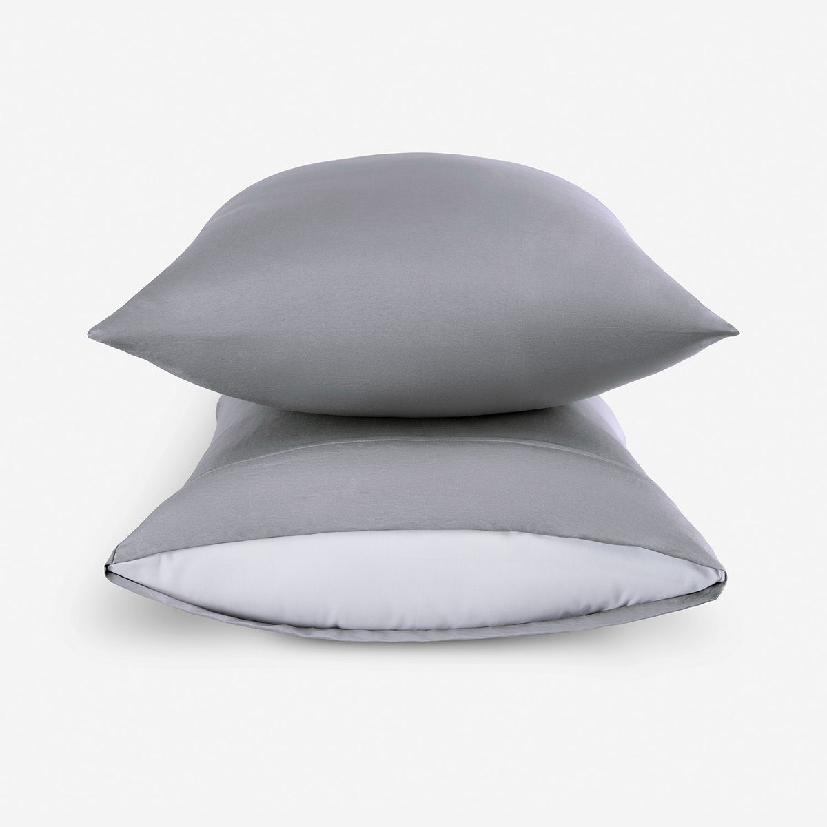 Two light grey pillowcases stacked.