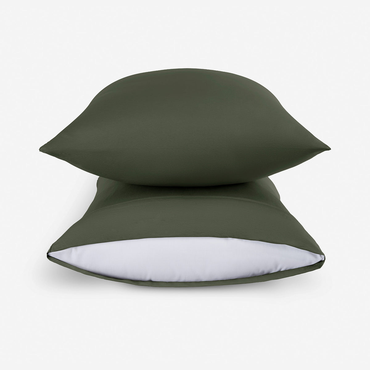Two stacked moss essential pillowcases.