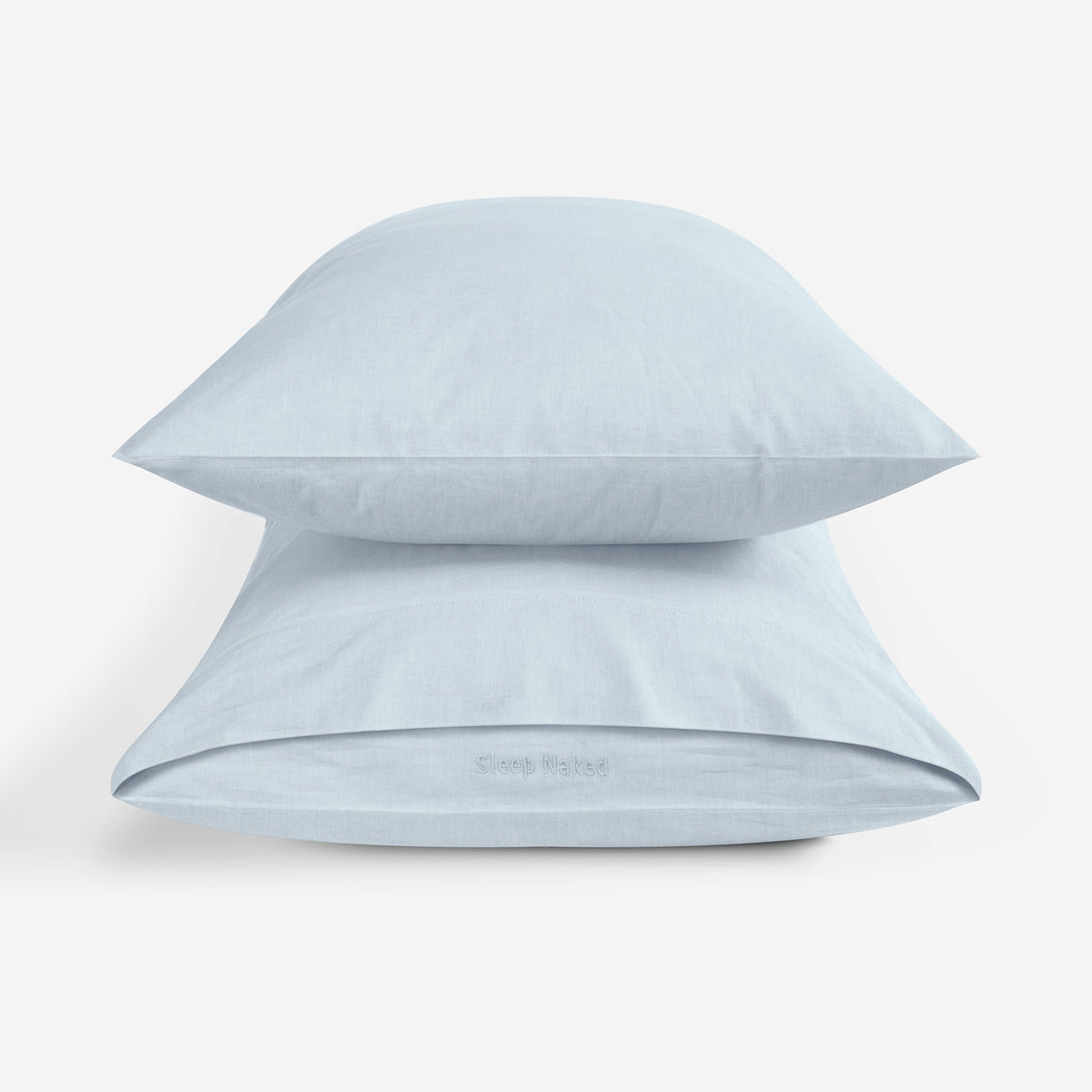 Two light blue pillowcases stacked on a clean white background.