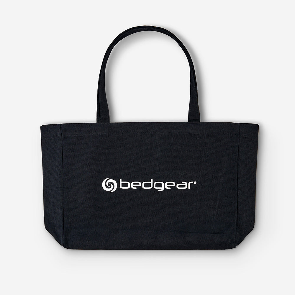 A BEDGEAR tote bag in front of a white background. 