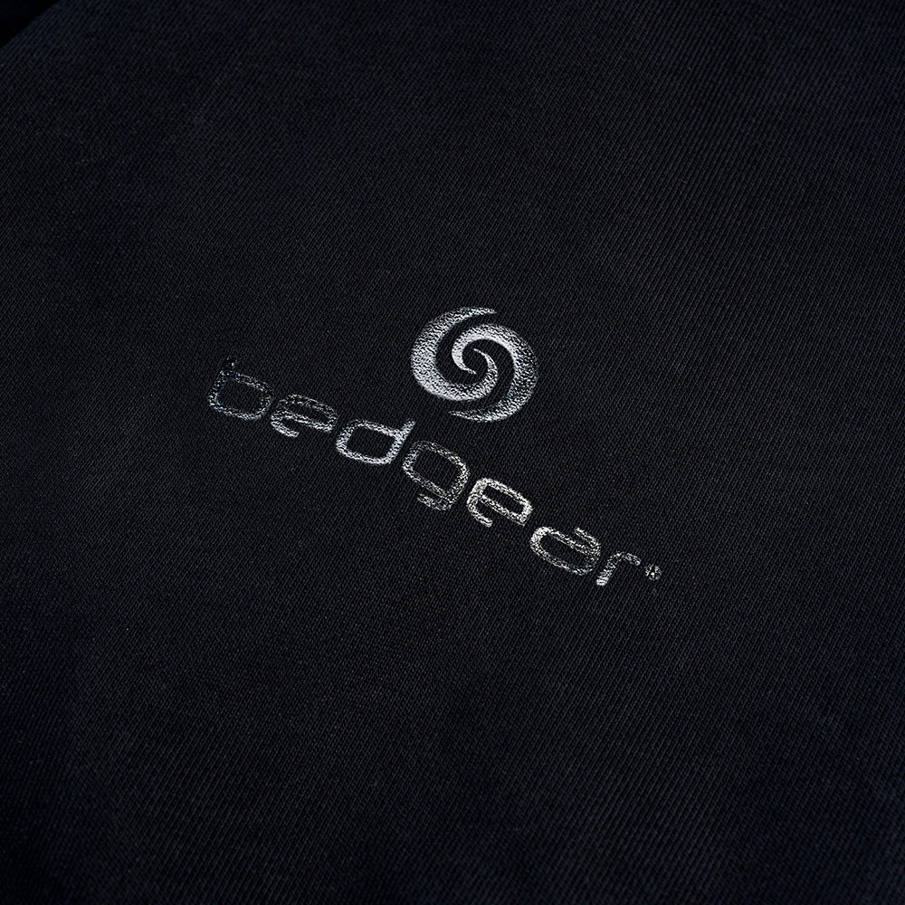 An image of BEDGEAR's logo on a t-shirt sleeve. 