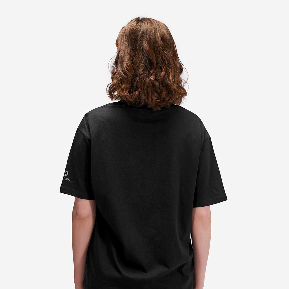 A woman wearing BEDGEAR's black Sleep Naked t-shirt. 