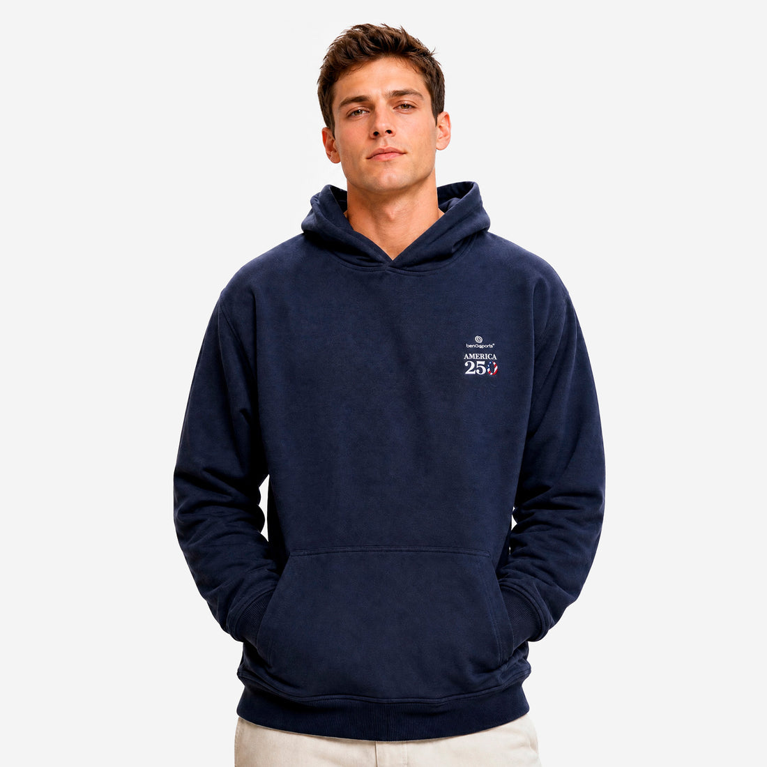 A man wearing BEDGEAR's America 250 hoodie. 
